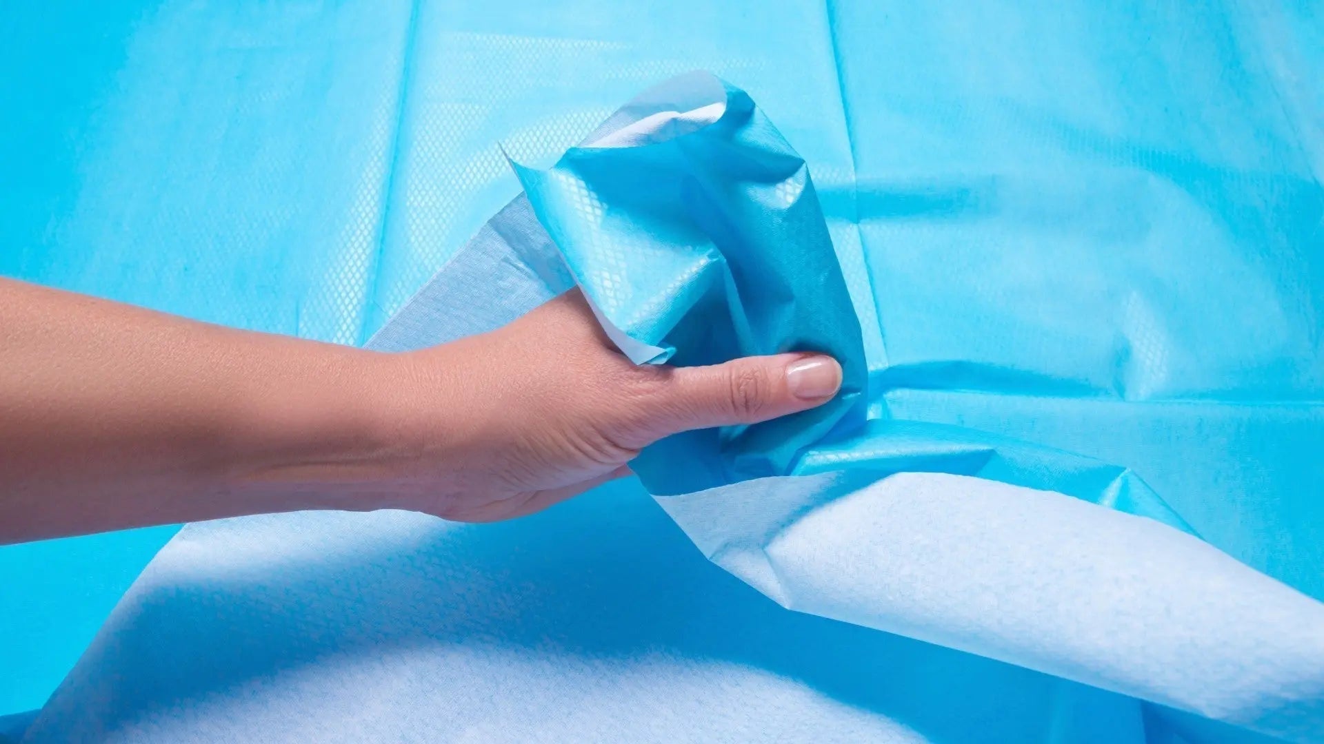 Waterproof mattress protector on hospital bed